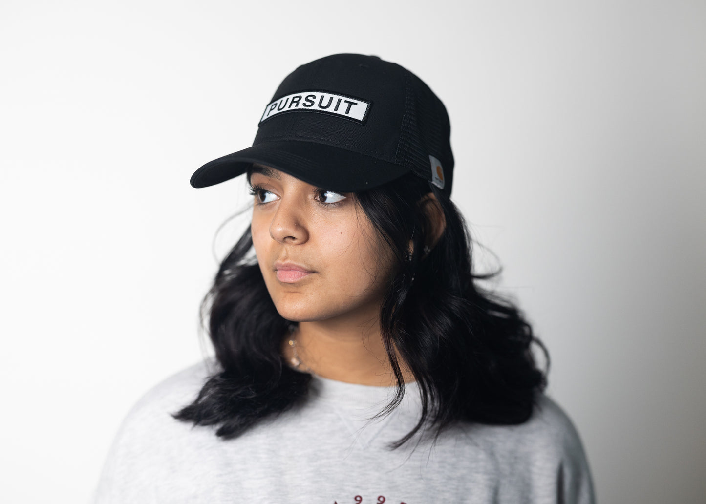 Pursuit Black Trucker Hat